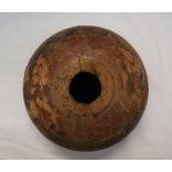 A 19th century shaped wooden bowl, painted with bands of iron red and black, possibly for opium,