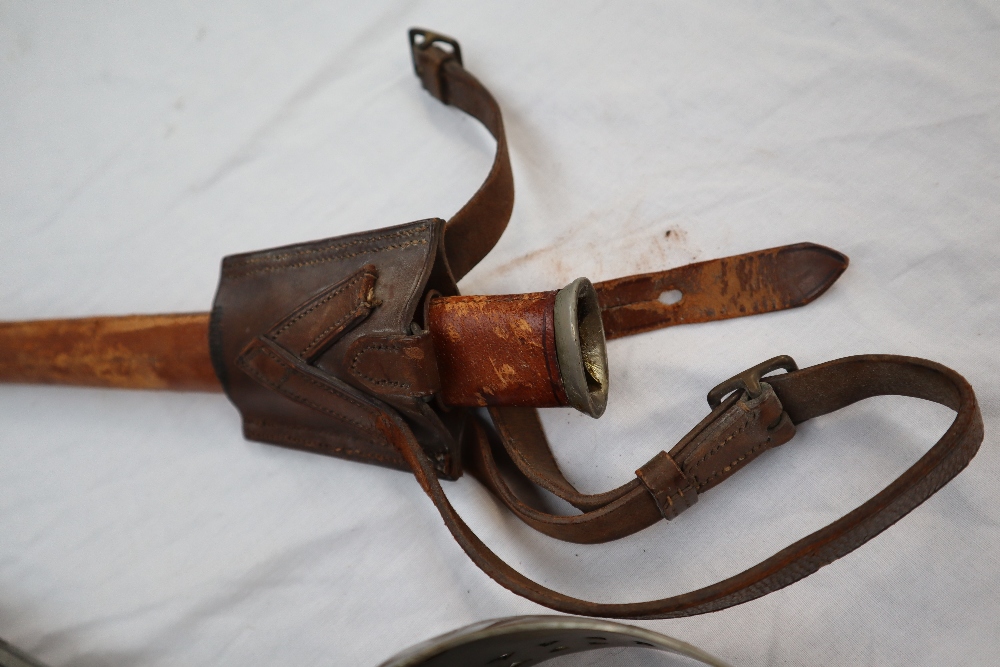 A dress sword with a pierced hand guard and leather grip, - Image 9 of 10