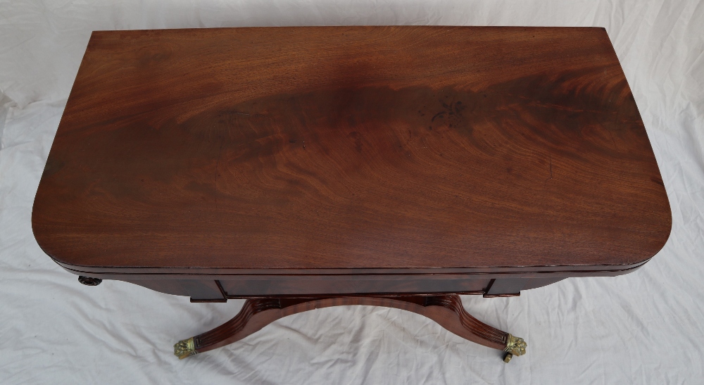 A Regency mahogany card table with a rectangular fold over top with a baize interior on a tapering - Image 5 of 7