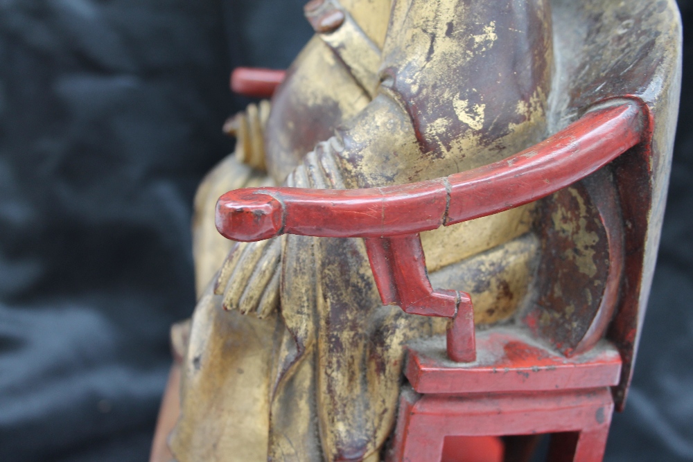 A Chinese carved, gilt and red painted figure of a seated dignitary, - Image 10 of 15