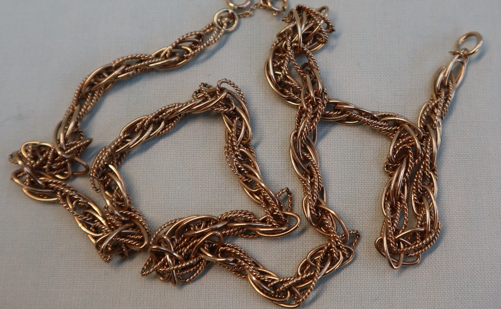 A 9ct yellow gold necklace, of rope twist form, with textured and smooth pointed oval links, - Image 2 of 3