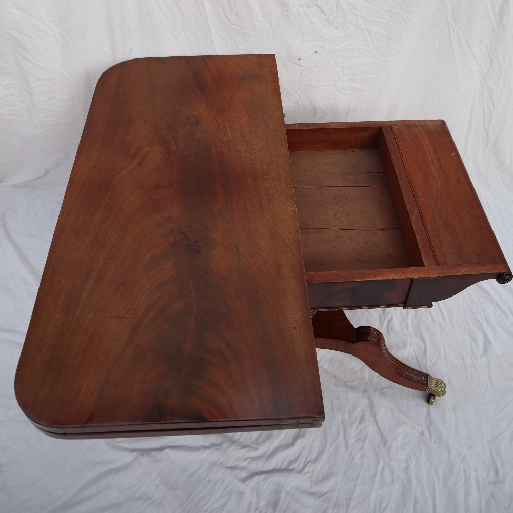 A Regency mahogany card table with a rectangular fold over top with a baize interior on a tapering - Image 4 of 7