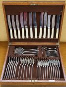 A George V silver Mappin and Webb cased silver flatware service comprising six table forks,