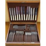 A George V silver Mappin and Webb cased silver flatware service comprising six table forks,