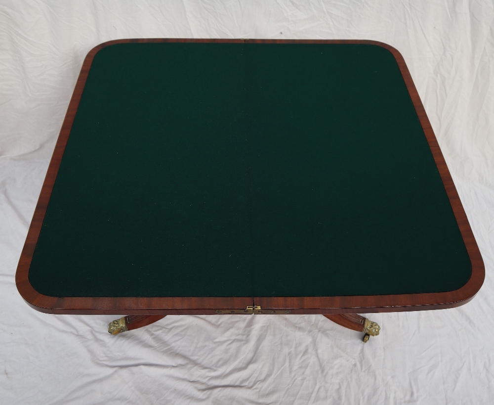 A Regency mahogany card table with a rectangular fold over top with a baize interior on a tapering - Image 3 of 7