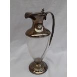 A George V silver topped and tapering cylindrical glass claret jug,