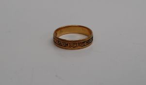 A late George III gold and enamel Momento Mori Mourning ring,