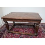 A 17th century and later oak refectory table,