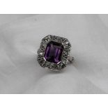 An amethyst and diamond ring,