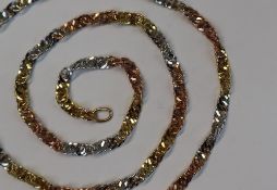 A 9ct three colour gold necklace, with twisted flattened oval links, 45.
