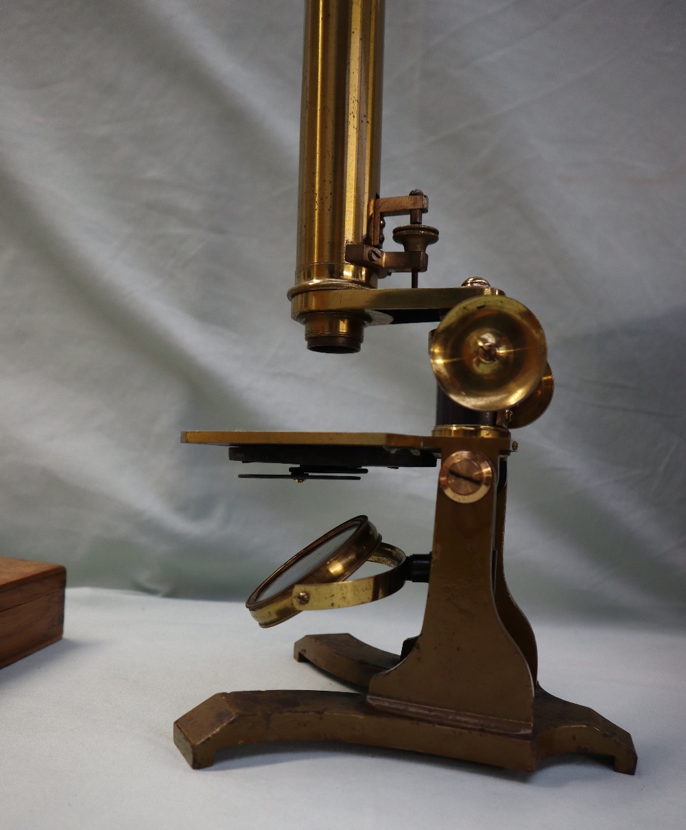 A brass monocular microscope, with rotating mirror, adjustable platform and various lenses, - Image 4 of 5