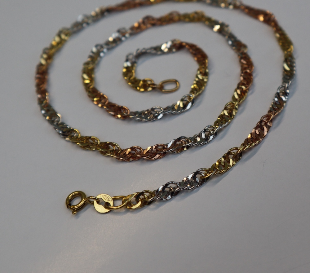 A 9ct three colour gold necklace, with twisted flattened oval links, 45. - Image 2 of 3