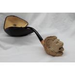 A Meerschaum pipe, the bowl carved as a lion's head, in a case with a Wm Astley & Co.