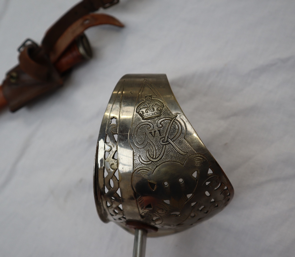 A dress sword with a pierced hand guard and leather grip, - Image 3 of 10