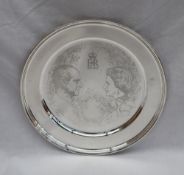 An Annigoni silver plate,