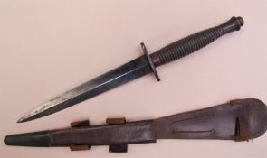 A Commando dagger, with a ribbed handle and tapering blade, 29.5cm long, blade 17.