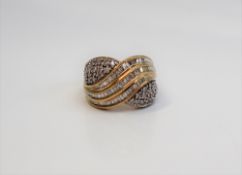 A 9ct yellow gold diamond set dress ring,