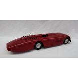 A Sunbeam 1000 land speed tin plate model car, with Dunlop Cord Racing wheels, repainted,