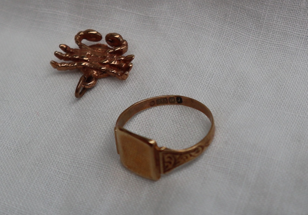 A 9ct yellow gold signet ring, together with a 9ct yellow gold crab charm, approximately 3. - Image 2 of 2