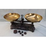 A pair of French brass and cast iron scales, with dished pans,