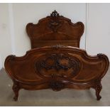 A French walnut bed,