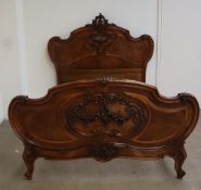 A French walnut bed,