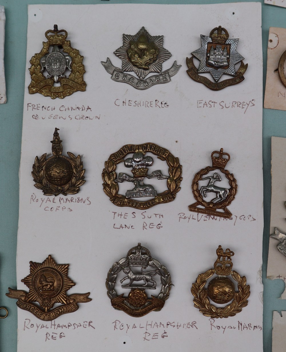 A collection of circa thirty five military cap badges including The Royal Armoured Corps, - Image 5 of 7