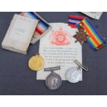 A set of three World War I medals including The British War Medal,