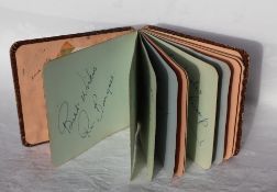 An autograph album, containing various autographs includingh Stanley Matthews, Tom Day,