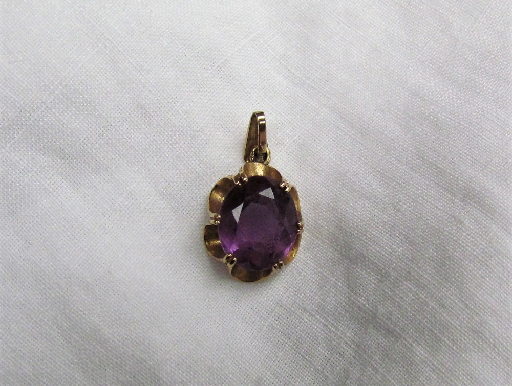 Two 9ct yellow gold amethyst set dress rings together with a yellow metal mounted amethyst pendant - Image 3 of 4