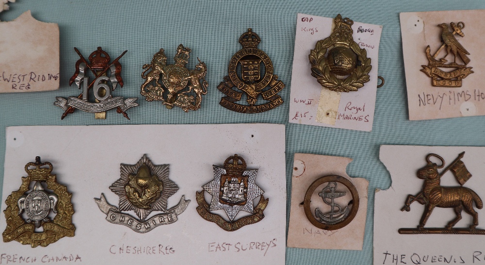 A collection of circa thirty five military cap badges including The Royal Armoured Corps, - Image 7 of 7