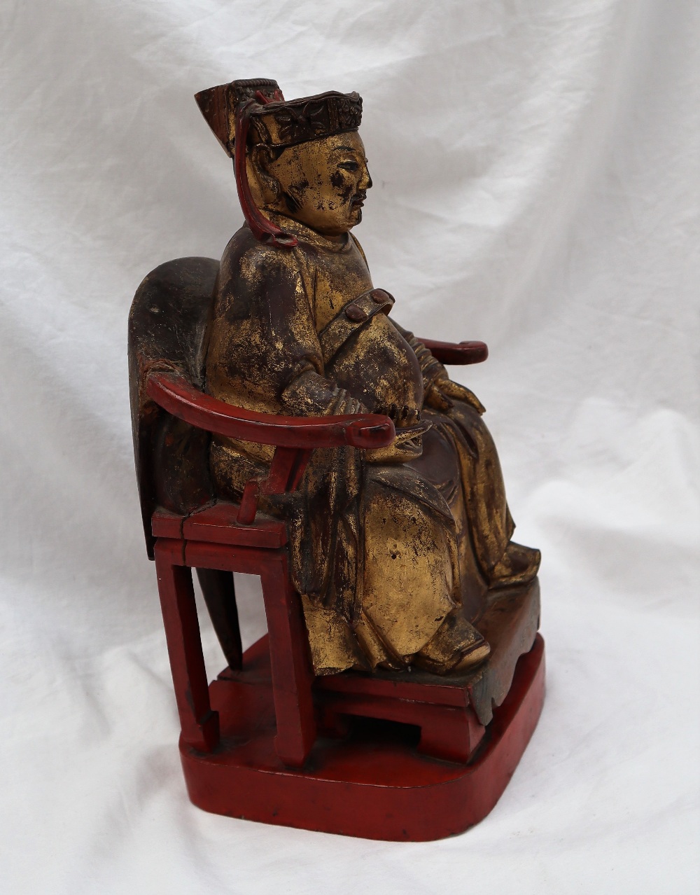 A Chinese carved, gilt and red painted figure of a seated dignitary, - Image 2 of 15