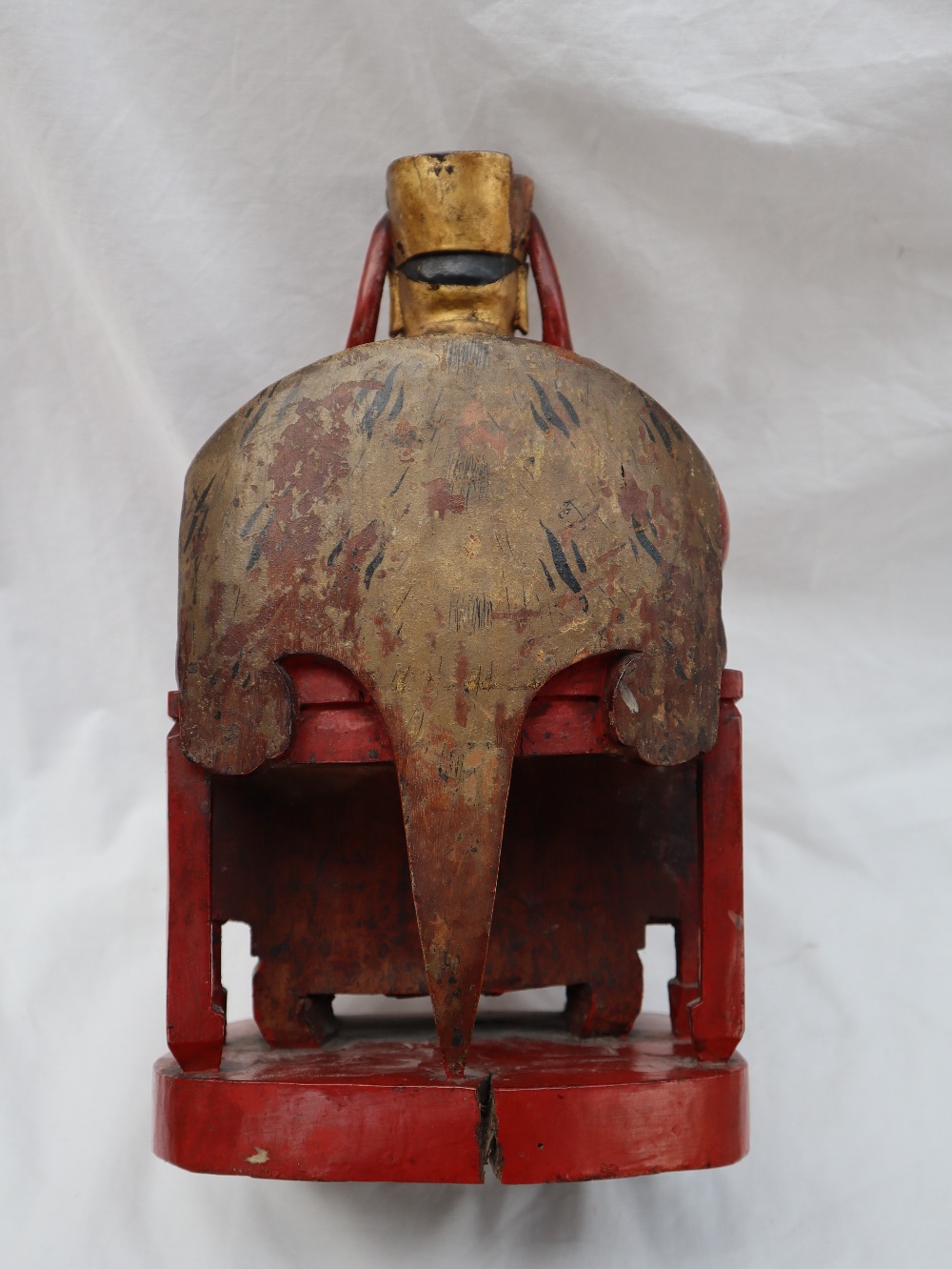 A Chinese carved, gilt and red painted figure of a seated dignitary, - Image 3 of 15