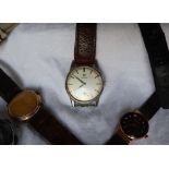 A Gentleman's Omega wristwatch, the silvered dial with a seconds subsidiary dial and batons,