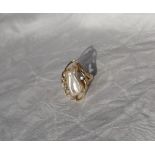 A pearl and diamond ring,