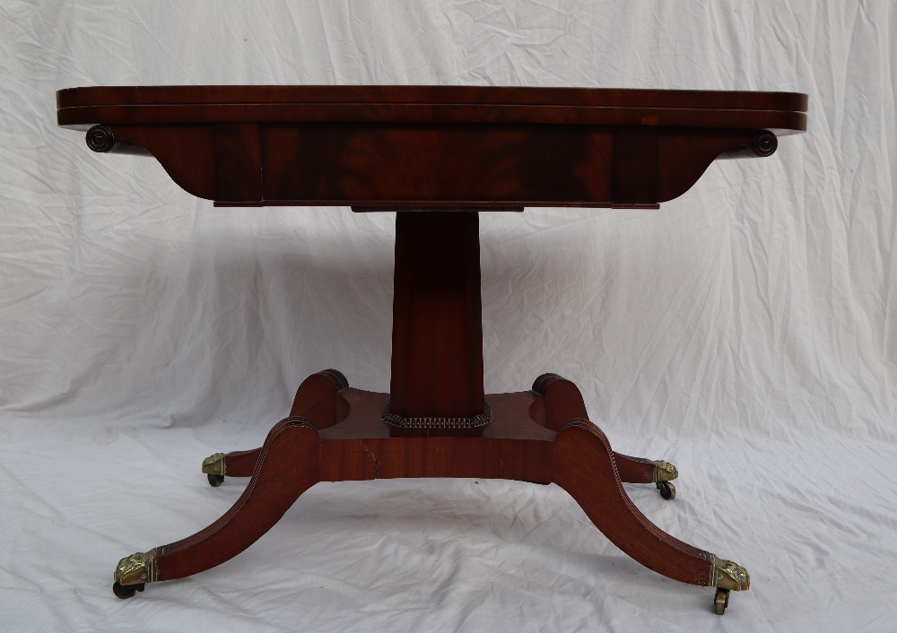 A Regency mahogany card table with a rectangular fold over top with a baize interior on a tapering - Image 6 of 7