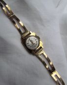 An 18ct yellow gold Lady's wristwatch,