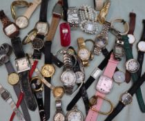 An Exaequo softwatch together with a large quantity of Lady's and Gentleman's fashion wristwatches,