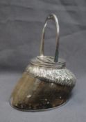 A horse hoof desk pocket watch stand, with stirrup mount and electroplated horsehair mount,