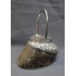 A horse hoof desk pocket watch stand, with stirrup mount and electroplated horsehair mount,