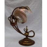 An Art Nouveau style table lamp, with a shell shade,