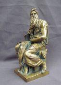 A bronze model of Michelangelo's Moses, with his voluminous beard,