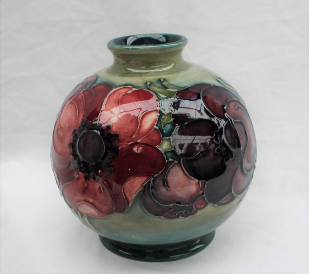 A Moorcroft pottery vase, of globular form decorated in the anemone pattern to a green ground, - Image 4 of 7