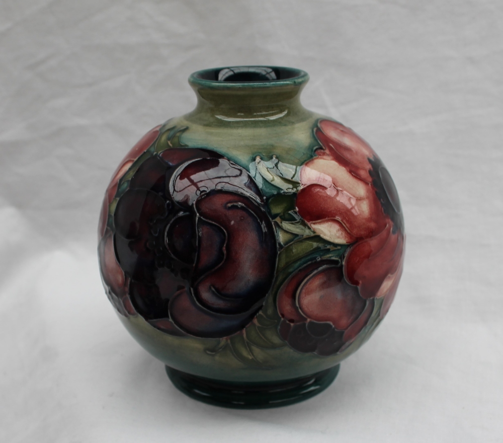 A Moorcroft pottery vase, of globular form decorated in the anemone pattern to a green ground, - Image 5 of 7