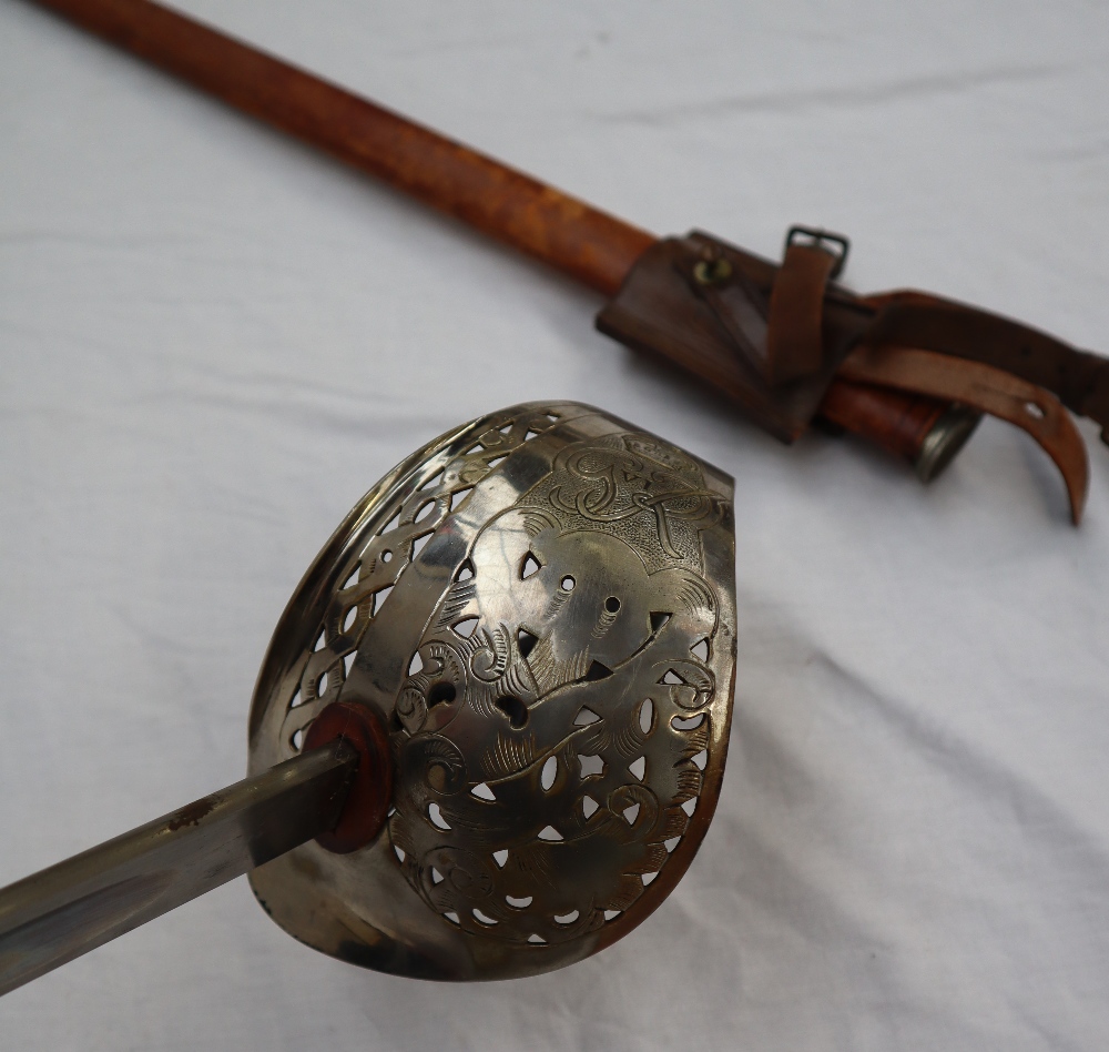 A dress sword with a pierced hand guard and leather grip, - Image 4 of 10