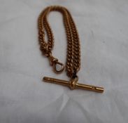 An 18ct yellow gold double Albert watch chain, with T bar and lobster clasp,