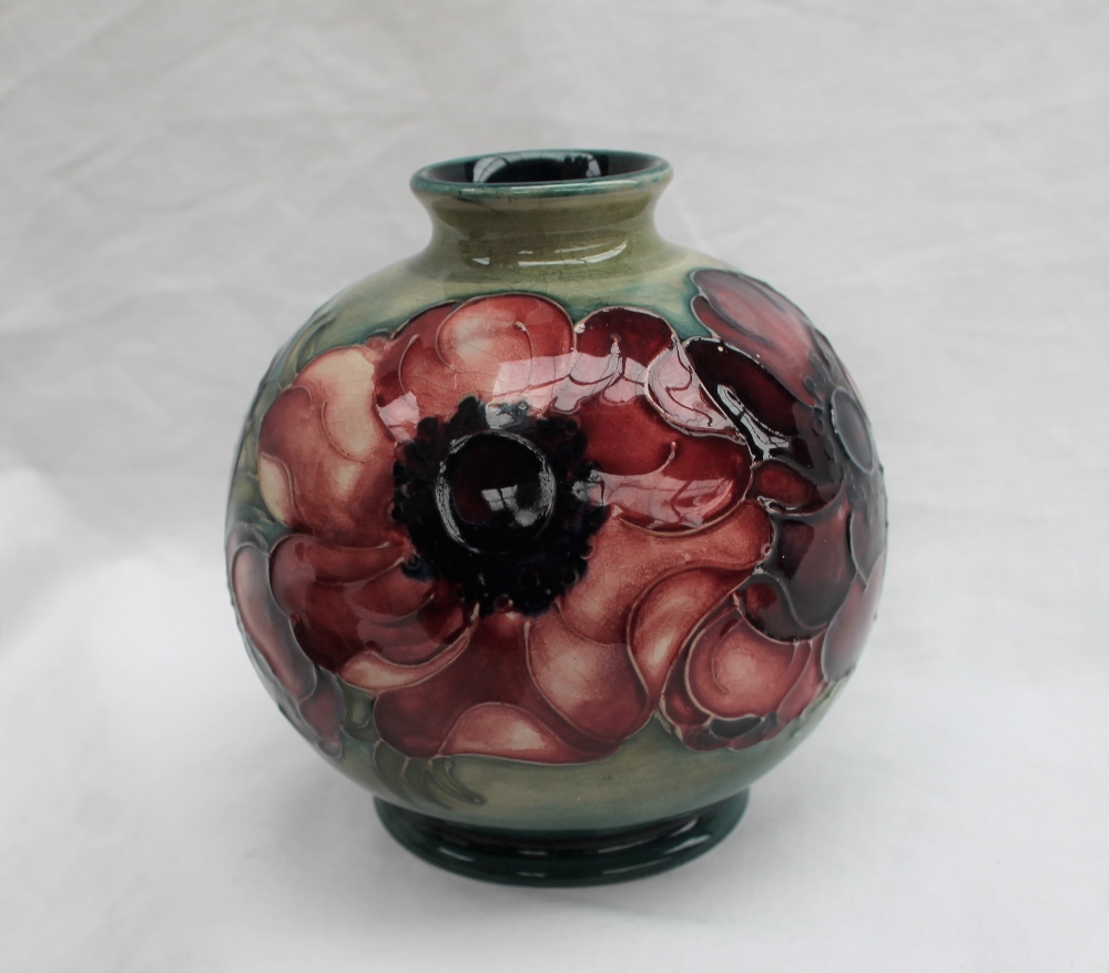 A Moorcroft pottery vase, of globular form decorated in the anemone pattern to a green ground, - Image 7 of 7