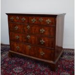 A George I walnut chest,