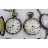 A late Victorian silver open faced pocket watch with an enamel dial,