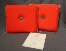 Two red Welsh wool cushions produced for the Investiture of His Royal Highness The Prince of Wales,